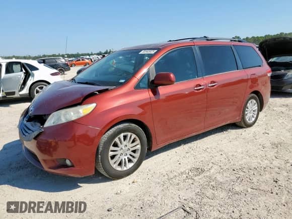 2014 Toyota Sienna XLE with VIN 5TDYK3DC1ES468830, listed as a Copart auction lot 85565925 with 190,880 mi miles and Salvage title. Bid and sale history available at DreamBid. Image 1.