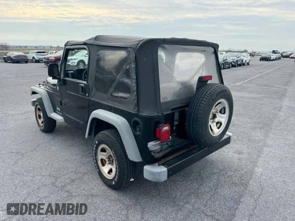 2005 Jeep Wrangler SE z VIN 1J4FA29145P369029, wystawiony jako Copart lot #81878874 z przebiegiem 102 942 mil mil oraz Czysty tytuł • Clean title. Historia ofert i sprzedaży dostępna na DreamBid. Obrazek 3.