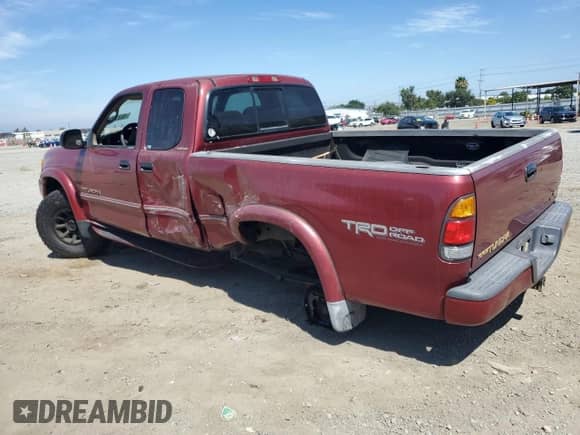 2001 Toyota Tundra Limited z VIN 5TBRT38161S194649, wystawiony jako Copart lot #66212845 z przebiegiem 272 341 mil mil oraz Szkoda całkowita • Salvage title. Historia ofert i sprzedaży dostępna na DreamBid. Obrazek 2.