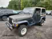 1997 Jeep Wrangler SE with VIN 1J4FY29P3VP474693, listed as a Copart auction lot 80686825 with 206,408 mi miles and Salvage title. Bid and sale history available at DreamBid. Image 1.
