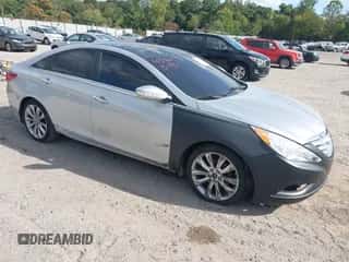 2012 Hyundai Sonata SE z VIN 5NPEC4AB0CH384762, wystawiony jako IAAI lot #43365790 z przebiegiem 169 742 mil mil oraz . Historia ofert i sprzedaży dostępna na DreamBid. Obrazek 1.