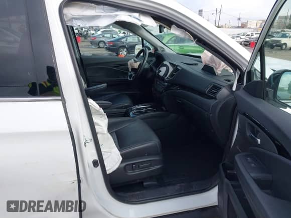 2022 Honda Pilot Elite с VIN 5FNYF6H02NB043594, выставлен на аукционе IAAI как лот 41550081 с пробегом 56 323 миль миль и . История ставок и продаж доступна на DreamBid. Изображение 5.