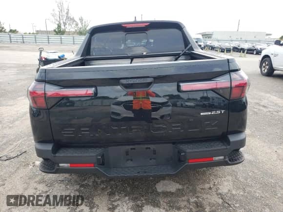 2023 Hyundai Santa Cruz SEL Premium with VIN 5NTJDDAF2PH057513, listed as a Copart auction lot 71204404 with 11,929 mi miles and Salvage title. Bid and sale history available at DreamBid. Image 6.