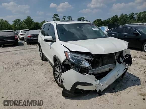 2019 Honda Pilot EX-L z VIN 5FNYF5H56KB020126, wystawiony jako Copart lot #80928675 z przebiegiem 122 327 mil mil oraz Szkoda całkowita • Salvage title. Historia ofert i sprzedaży dostępna na DreamBid. Obrazek 14.