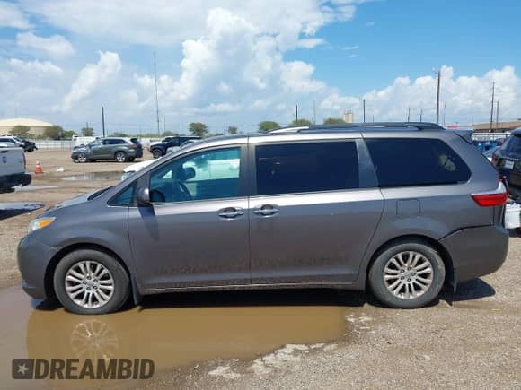 2015 Toyota Sienna XLE with VIN 5TDYK3DC7FS662215, listed as a IAAI auction lot 43208864 with 142,089 mi miles and . Bid and sale history available at DreamBid. Image 14.