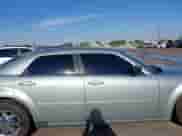 2005 Chrysler 300 300 z VIN 2C3JA43R95H140865, wystawiony jako IAAI lot #43090050 z przebiegiem 88 466 mil mil oraz . Historia ofert i sprzedaży dostępna na DreamBid. Obrazek 13.