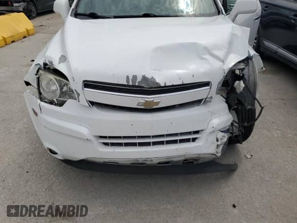 2012 Chevrolet Captiva Sport LTZ with VIN 3GNFL4E55CS609019, listed as a Copart auction lot 64484415 with Not provided miles and Salvage title. Bid and sale history available at DreamBid. Image 12.