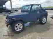 1990 Jeep Wrangler с VIN 2J4FY29TXLJ531804, выставлен на аукционе Copart как лот 65004215 с пробегом 108 658 миль миль и Чистый • Clean title. История ставок и продаж доступна на DreamBid. Изображение 1.