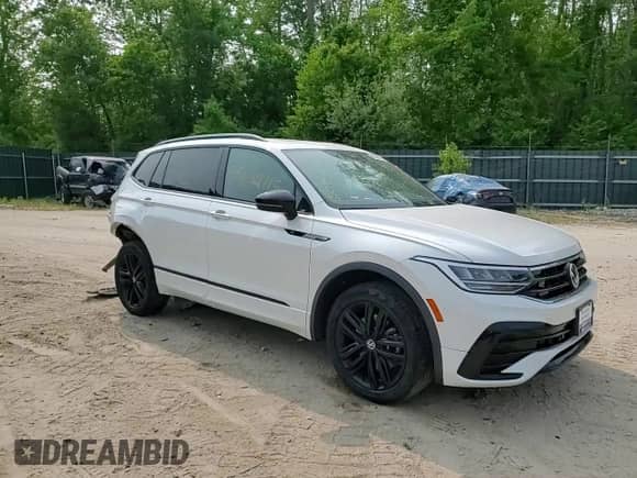 2022 Volkswagen Tiguan SE R-Line Black с VIN 3VV8B7AX0NM123126, выставлен на аукционе Copart как лот 59694715 с пробегом 33 219 миль миль и Списание • Salvage title. История ставок и продаж доступна на DreamBid. Изображение 14.