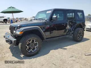 2023 Jeep Wrangler Rubicon с VIN 1C4JJXR69PW620967, выставлен на аукционе Copart как лот 67594255 с пробегом 23 926 миль миль и Списание • Salvage title. История ставок и продаж доступна на DreamBid. Изображение 1.