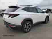 2022 Hyundai Tucson Limited z VIN 5NMJE3AE6NH112231, wystawiony jako Copart lot #81631545 z przebiegiem 63 438 mil mil oraz Szkoda całkowita • Salvage title. Historia ofert i sprzedaży dostępna na DreamBid. Obrazek 3.