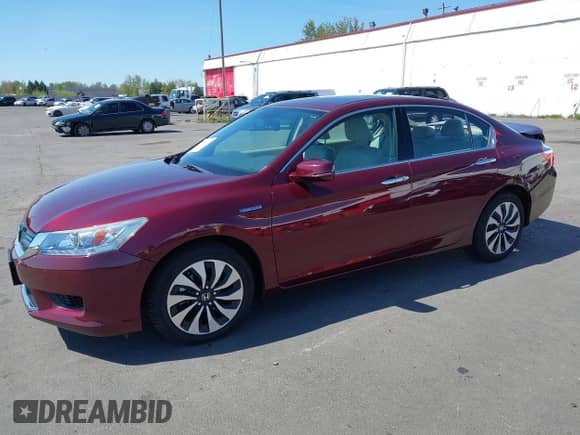 2015 Honda Accord Touring with VIN 1HGCR6F71FA002872, listed as a IAAI auction lot 42001036 with 27,505 mi miles and . Bid and sale history available at DreamBid. Image 2.