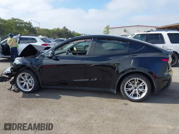 2023 Tesla Model Y Long Range с VIN 7SAYGAEE1PF594220, выставлен на аукционе IAAI как лот 42885301 с пробегом 94 878 миль миль и . История ставок и продаж доступна на DreamBid. Изображение 15.
