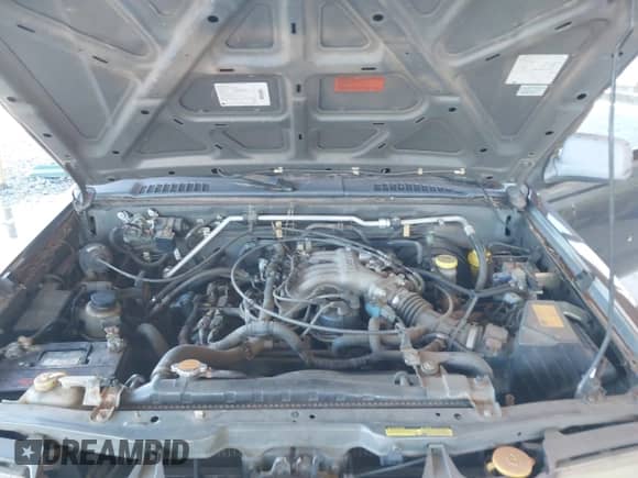 2000 Nissan Frontier XE z VIN 1N6ED27Y7YC359063, wystawiony jako IAAI lot #43511807 z przebiegiem 253 190 mil mil oraz . Historia ofert i sprzedaży dostępna na DreamBid. Obrazek 10.