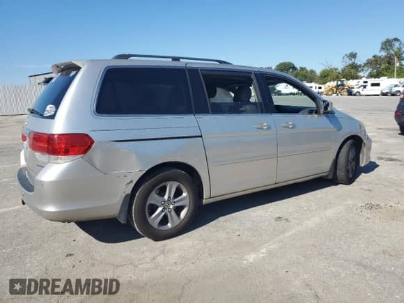 2009 Honda Odyssey Touring с VIN 5FNRL38919B055431, выставлен на аукционе Copart как лот 84251825 с пробегом 275 017 миль миль и Списание • Salvage title. История ставок и продаж доступна на DreamBid. Изображение 3.