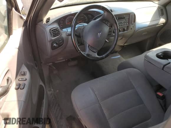 2003 Ford F-150 XL с VIN 1FTRF17W73NA55543, выставлен на аукционе Copart как лот 66516465 с пробегом 141 097 миль миль и Списание • Salvage title. История ставок и продаж доступна на DreamBid. Изображение 8.