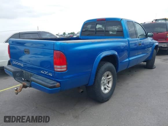 1998 Dodge Dakota SLT with VIN 1B7GG22Y5WS615441, listed as a IAAI auction lot 43046552 with 168,033 mi miles and . Bid and sale history available at DreamBid. Image 4.