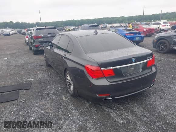 2009 BMW 7 Series 750Li with VIN WBAKB83579CY57949, listed as a IAAI auction lot 42512840 with 124,904 mi miles and . Bid and sale history available at DreamBid. Image 3.