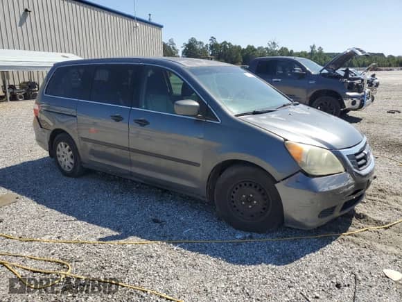 2010 Honda Odyssey LX с VIN 5FNRL3H28AB062710, выставлен на аукционе Copart как лот 71060715 с пробегом 240 460 миль миль и Списание • Salvage title. История ставок и продаж доступна на DreamBid. Изображение 4.