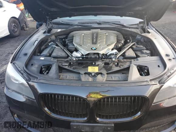 2011 BMW 7 Series 750Li xDrive with VIN WBAKC8C55BC434418, listed as a Copart auction lot 77957584 with 87,595 mi miles and Salvage title. Bid and sale history available at DreamBid. Image 11.