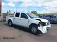 2014 Nissan Frontier SV z VIN 1N6AD0EV9EN726492, wystawiony jako IAAI lot #42749752 z przebiegiem 213 328 mil mil oraz . Historia ofert i sprzedaży dostępna na DreamBid. Obrazek 1.