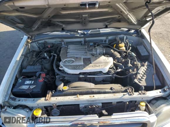 2003 Nissan Pathfinder SE z VIN JN8DR09Y03W809861, wystawiony jako Copart lot #65631275 z przebiegiem 132 716 mil mil oraz Szkoda całkowita • Salvage title. Historia ofert i sprzedaży dostępna na DreamBid. Obrazek 12.