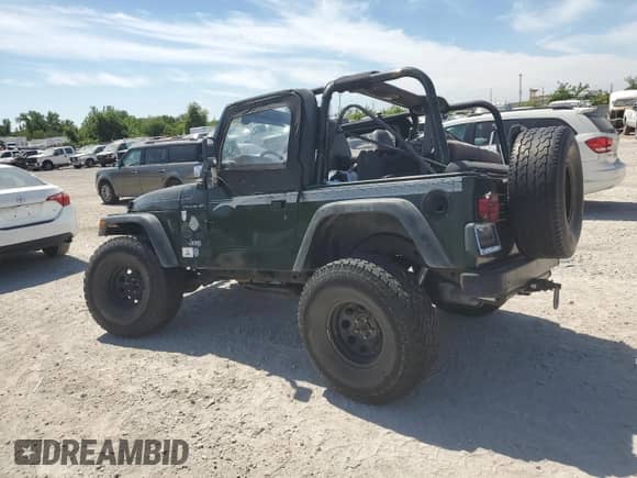 1997 Jeep Wrangler SE с VIN 1J4FY29P3VP508471, выставлен на аукционе Copart как лот 70949895 с пробегом 168 706 миль миль и Списание • Salvage title. История ставок и продаж доступна на DreamBid. Изображение 2.