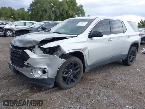 2019 Chevrolet Traverse LS z VIN 1GNERFKW5KJ314599, wystawiony jako IAAI lot #43197716 z przebiegiem 102 349 mil mil oraz . Historia ofert i sprzedaży dostępna na DreamBid. Obrazek 17.