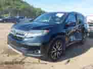 2019 Honda Pilot Touring 8-Passenger with VIN 5FNYF6H99KB011820, listed as a IAAI auction lot 42799995 with 72,904 mi miles and . Bid and sale history available at DreamBid. Image 17.