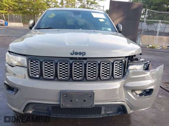 2020 Jeep Grand Cherokee Laredo E with VIN 1C4RJFAG9LC313781, listed as a IAAI auction lot 43205694 with 67,222 mi miles and . Bid and sale history available at DreamBid. Image 13.