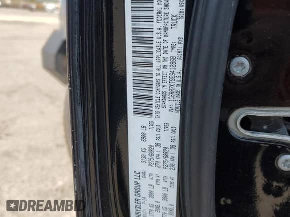 2014 Ram 1500 Express with VIN 1C6RR7KT9ES412868, listed as a Copart auction lot 81024195 with 201,634 mi miles and Salvage title. Bid and sale history available at DreamBid. Image 12.