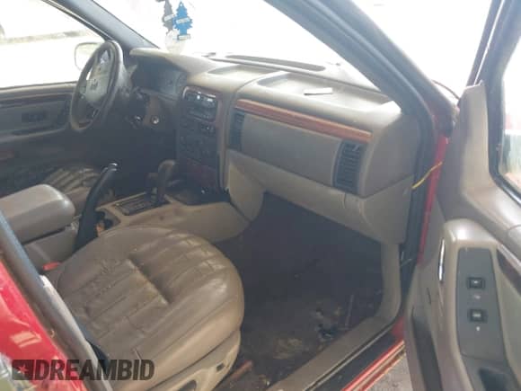 1999 Jeep Grand Cherokee Limited с VIN 1J4GW68N9XC697638, выставлен на аукционе IAAI как лот 43077209 с пробегом Не указан миль и . История ставок и продаж доступна на DreamBid. Изображение 5.