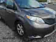 2012 Toyota Sienna with VIN 5TDZK3DCXCS233781, listed as a Copart auction lot 82167325 with 183,332 mi miles and Salvage title. Bid and sale history available at DreamBid. Image 14.