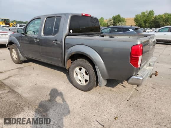 2005 Nissan Frontier Nismo с VIN 1N6AD07W35C430322, выставлен на аукционе Copart как лот 71000325 с пробегом 298 547 миль миль и Списание • Salvage title. История ставок и продаж доступна на DreamBid. Изображение 2.
