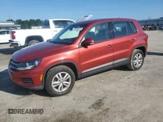 2014 Volkswagen Tiguan S with VIN WVGAV3AX9EW105543, listed as a Copart auction lot 69123875 with Not provided miles and Clean title. Bid and sale history available at DreamBid. Image 1.