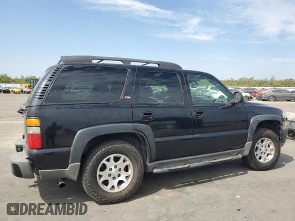 2005 Chevrolet Tahoe Z71 with VIN 1GNEK13T25R252130, listed as a Copart auction lot 70705725 with 240,574 mi miles and Salvage title. Bid and sale history available at DreamBid. Image 3.