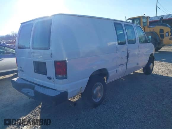 2003 Ford Econoline Cargo with VIN 1FTNE24L23HA98641, listed as a IAAI auction lot 41285948 with 257,510 mi miles and . Bid and sale history available at DreamBid. Image 4.
