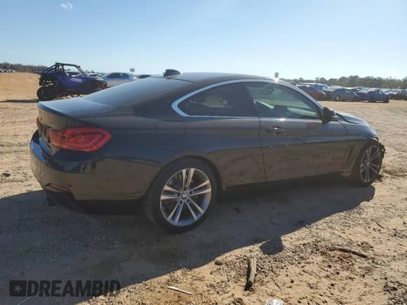 2019 BMW 4 Series 440i with VIN WBA4W7C55KAG53033, listed as a Copart auction lot 48412235 with 67,188 mi miles and Salvage title. Bid and sale history available at DreamBid. Image 3.