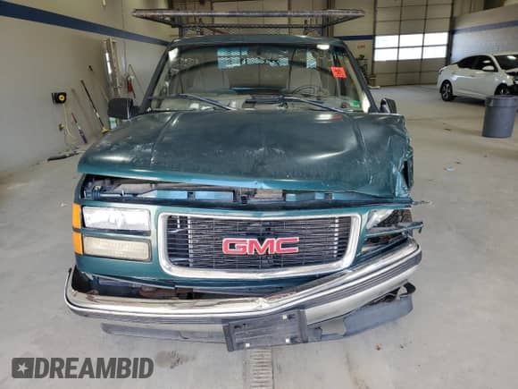 1998 GMC Sierra 1500 z VIN 2GTEC19M7W1557218, wystawiony jako Copart lot #51055425 z przebiegiem 311 370 mil mil oraz Szkoda całkowita • Salvage title. Historia ofert i sprzedaży dostępna na DreamBid. Obrazek 5.