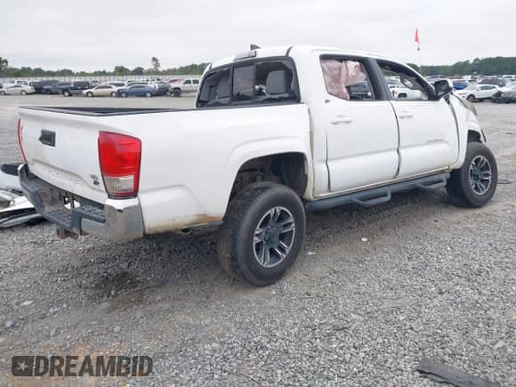 2016 Toyota Tacoma TRD Off Road with VIN 3TMAZ5CN1GM006167, listed as a IAAI auction lot 43133468 with Not provided miles and . Bid and sale history available at DreamBid. Image 4.