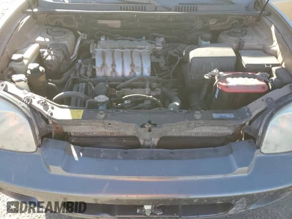 2004 Hyundai Santa Fe GLS z VIN KM8SC13E64U786989, wystawiony jako Copart lot #86345804 z przebiegiem 168 016 mil mil oraz Szkoda całkowita • Salvage title. Historia ofert i sprzedaży dostępna na DreamBid. Obrazek 11.