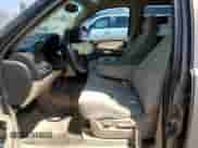 2007 Chevrolet Tahoe LS z VIN 1GNFC13JX7R230251, wystawiony jako Copart lot #65454845 z przebiegiem 176 339 mil mil oraz Czysty tytuł • Clean title. Historia ofert i sprzedaży dostępna na DreamBid. Obrazek 7.