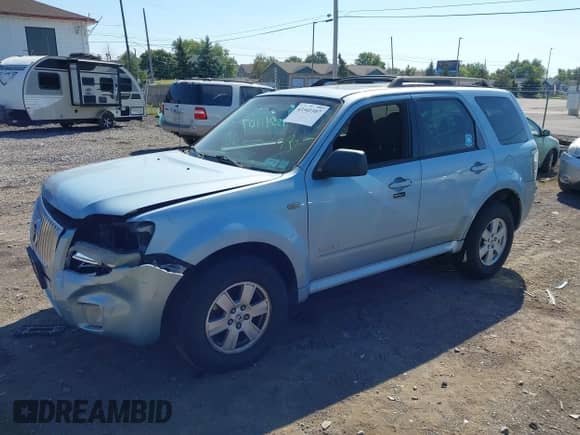 2008 Mercury Mariner with VIN 4M2CU91198KJ24730, listed as a IAAI auction lot 43341107 with 158,521 mi miles and . Bid and sale history available at DreamBid. Image 17.