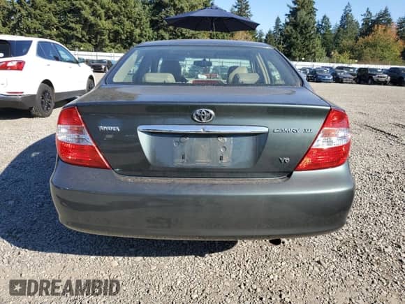 2002 Toyota Camry XLE with VIN JTDBF30K320043468, listed as a Copart auction lot 82289975 with 235,912 mi miles and Salvage title. Bid and sale history available at DreamBid. Image 6.