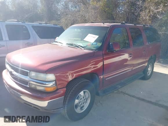 2002 Chevrolet Suburban LT z VIN 1GNEC16Z02J229078, wystawiony jako IAAI lot #41737482 z przebiegiem 306 502 mil mil oraz . Historia ofert i sprzedaży dostępna na DreamBid. Obrazek 2.