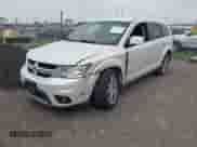 2013 Dodge Journey R/T z VIN 3C4PDCEG5DT642751, wystawiony jako IAAI lot #42306951 z przebiegiem 129 338 mil mil oraz . Historia ofert i sprzedaży dostępna na DreamBid. Obrazek 2.