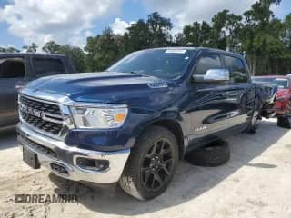 2023 Ram 1500 Lone Star with VIN 1C6SRFFT8PN660729, listed as a Copart auction lot 84884895 with 40,056 mi miles and Salvage title. Bid and sale history available at DreamBid. Image 1.
