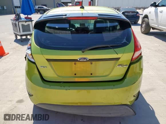 2012 Ford Fiesta SES with VIN 3FADP4FJ3CM111721, listed as a Copart auction lot 80182725 with 119,654 mi miles and Salvage title. Bid and sale history available at DreamBid. Image 6.