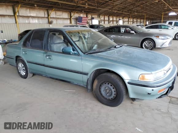 1992 Honda Accord LX z VIN JHMCB7657NC026120, wystawiony jako Copart lot #81516735 z przebiegiem 176 004 mil mil oraz Szkoda całkowita • Salvage title. Historia ofert i sprzedaży dostępna na DreamBid. Obrazek 4.