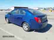 2014 Chevrolet Sonic LT z VIN 1G1JC5SH7E4117143, wystawiony jako IAAI lot #43434507 z przebiegiem 150 058 mil mil oraz . Historia ofert i sprzedaży dostępna na DreamBid. Obrazek 3.